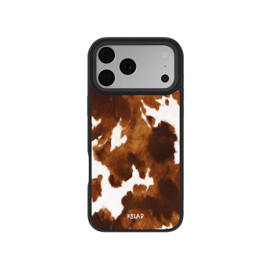 Brown and white cow print iPhone case by KELAB with mahogany tones and soft fur-like pattern, designed for a rustic, country-inspired aesthetic.
