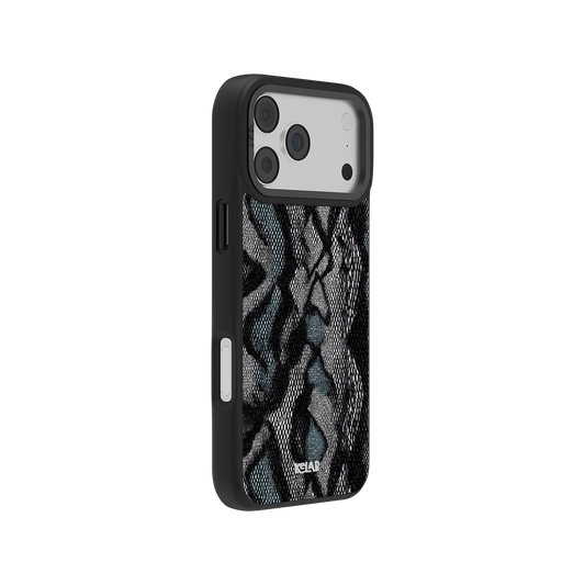 Teal snakeskin phone case with black edges, featuring a realistic reptile scale texture for a bold, luxury look. Designed for modern smartphones.