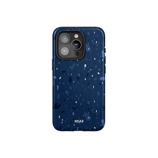 Navy blue marble terrazzo phone case by KELAB with periwinkle and sky blue speckles, designed for iPhone with a sleek glossy finish.