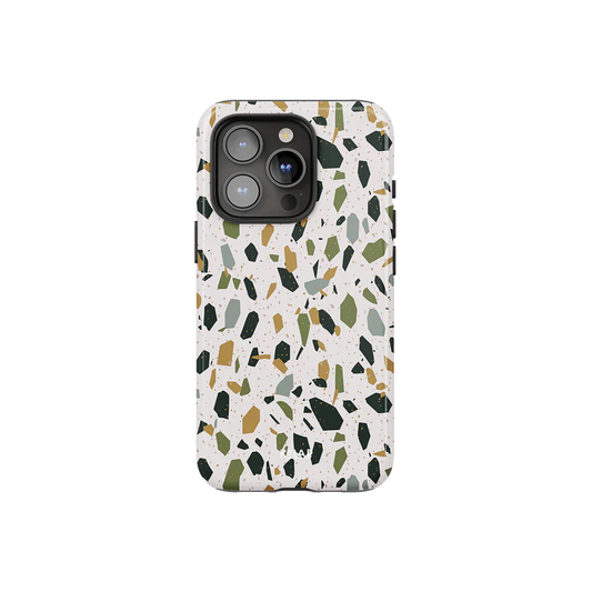 White Marble Terrazzo Phone Case by KELAB featuring a creamy base with green, mustard, and black speckles. Ideal for stylish iPhone protection.