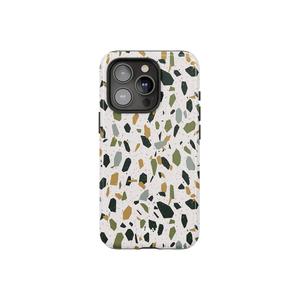 White Marble Terrazzo Phone Case by KELAB featuring a creamy base with green, mustard, and black speckles. Ideal for stylish iPhone protection.
