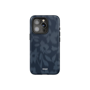 Blue floral phone case with blurred flower texture by KELAB, featuring a moody navy design and glossy finish for iPhone protection.