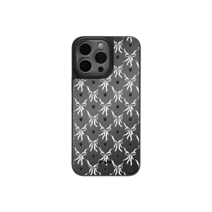 Gothic Halloween phone case with violet bow pattern and mirror back, featuring a black and white symmetrical Victorian design.