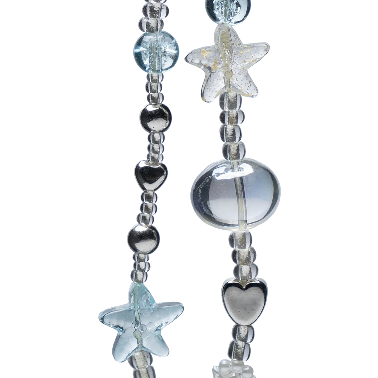 Close-up of Crystal Sea Star Phone Charm showing detailed heart, shell, and star beads in metallic and translucent finishes.