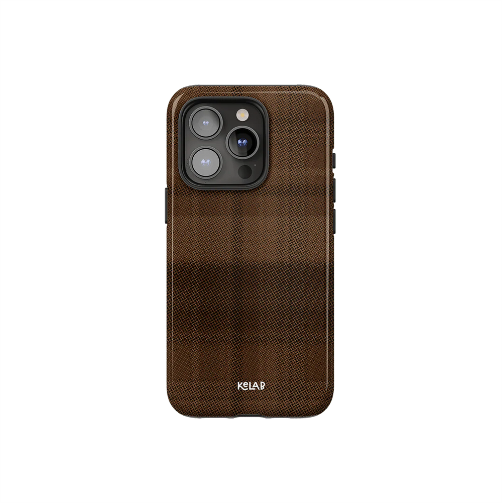 Minimalist phone case with brown flannel design by KELAB featuring a subtle checkered pattern and camera cutout for iPhone models.