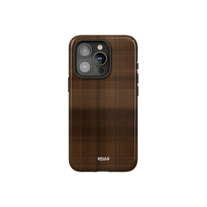 Minimalist phone case with brown flannel design by KELAB featuring a subtle checkered pattern and camera cutout for iPhone models.