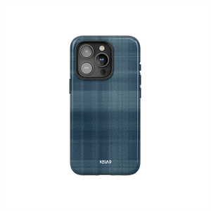 Minimalist iPhone case with blue flannel design by KELAB featuring a checkered pattern and subtle texture. Stylish and protective phone accessory.
