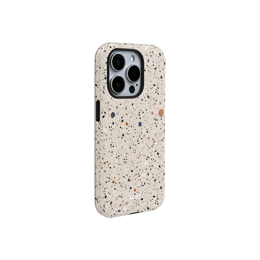 Side view of KELAB's Ivory Haze paint splatter phone case featuring a sleek, speckled white design with gradient color accents.