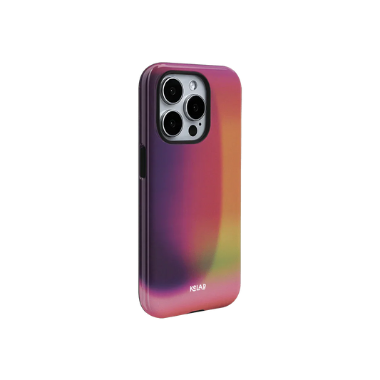 Colorful KELAB Lucid Ember phone case with magenta and orange gradient, designed for iPhone with sleek, modern aesthetics.