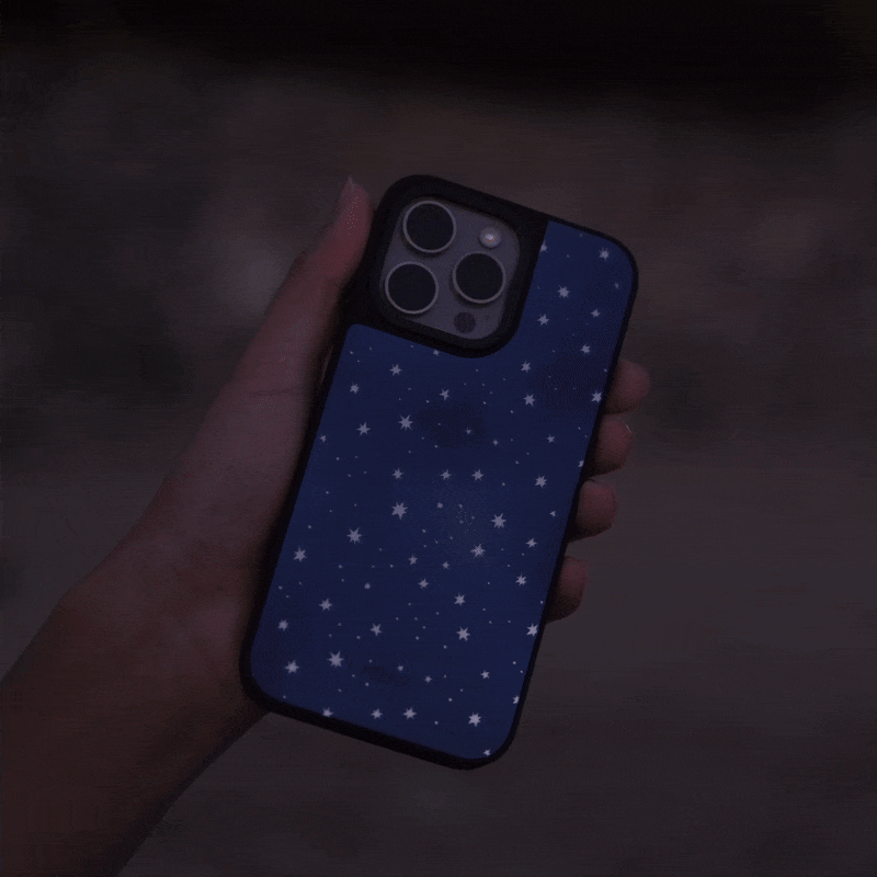 Starry Blue iPhone Reflective Mirror Case by KELAB features a deep blue gradient with shimmering stars. Durable and dreamy, perfect for stargazers.