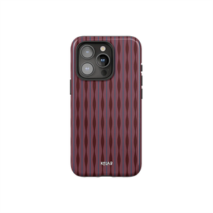 Mulberry burgundy phone case with wavy textured design by KELAB, featuring a glossy ripple pattern and precise camera cutout.