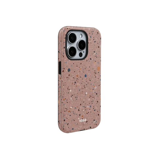 Minimalist pink paint splatter phone case with gradient color and side button cutouts, offering a slim and stylish look for modern smartphones.