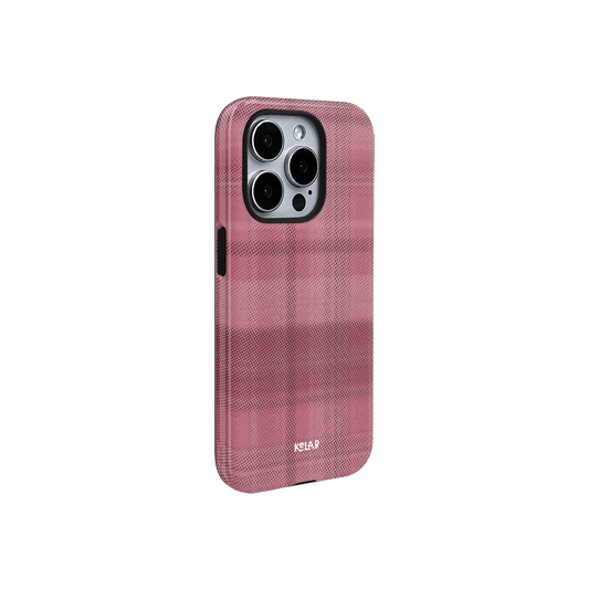 Rosé pink flannel minimalist phone case by KELAB shown at an angle, highlighting its subtle grid texture and slim profile for modern smartphones.