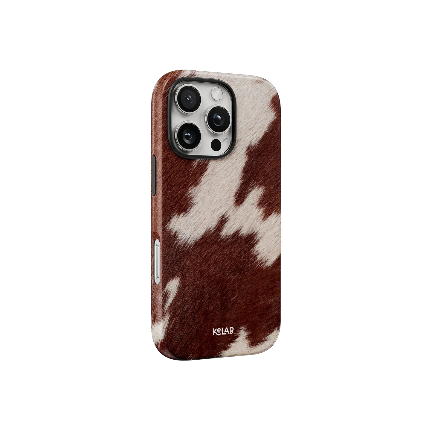 Side view of the Cow Print Brown iPhone Case – Western Aesthetic by KELAB, showcasing the rustic animal print and precise button cutouts.