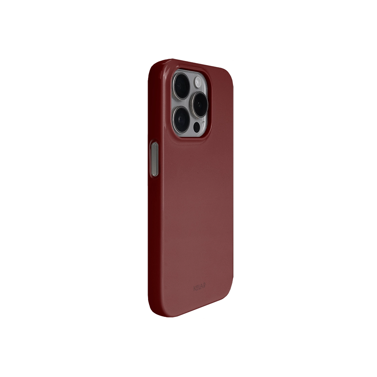 Angled view of KELAB solid burnt red phone case showcasing minimalist style, glossy surface, and protective button coverage.