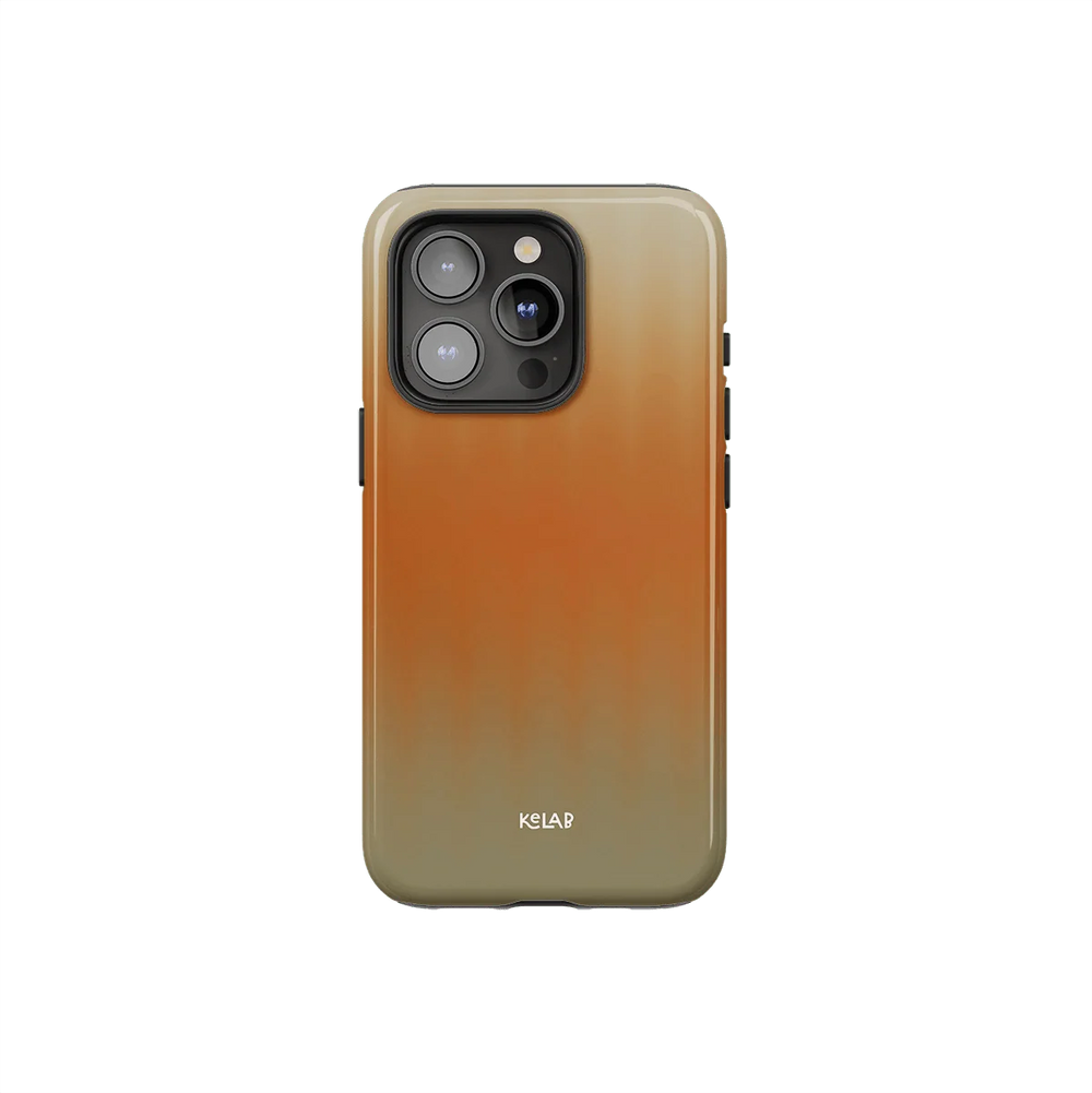 Minimalist orange phone case with glossy gradient finish from KELAB's Tinted Veil Series. Features warm sunset tones and sleek designer style.