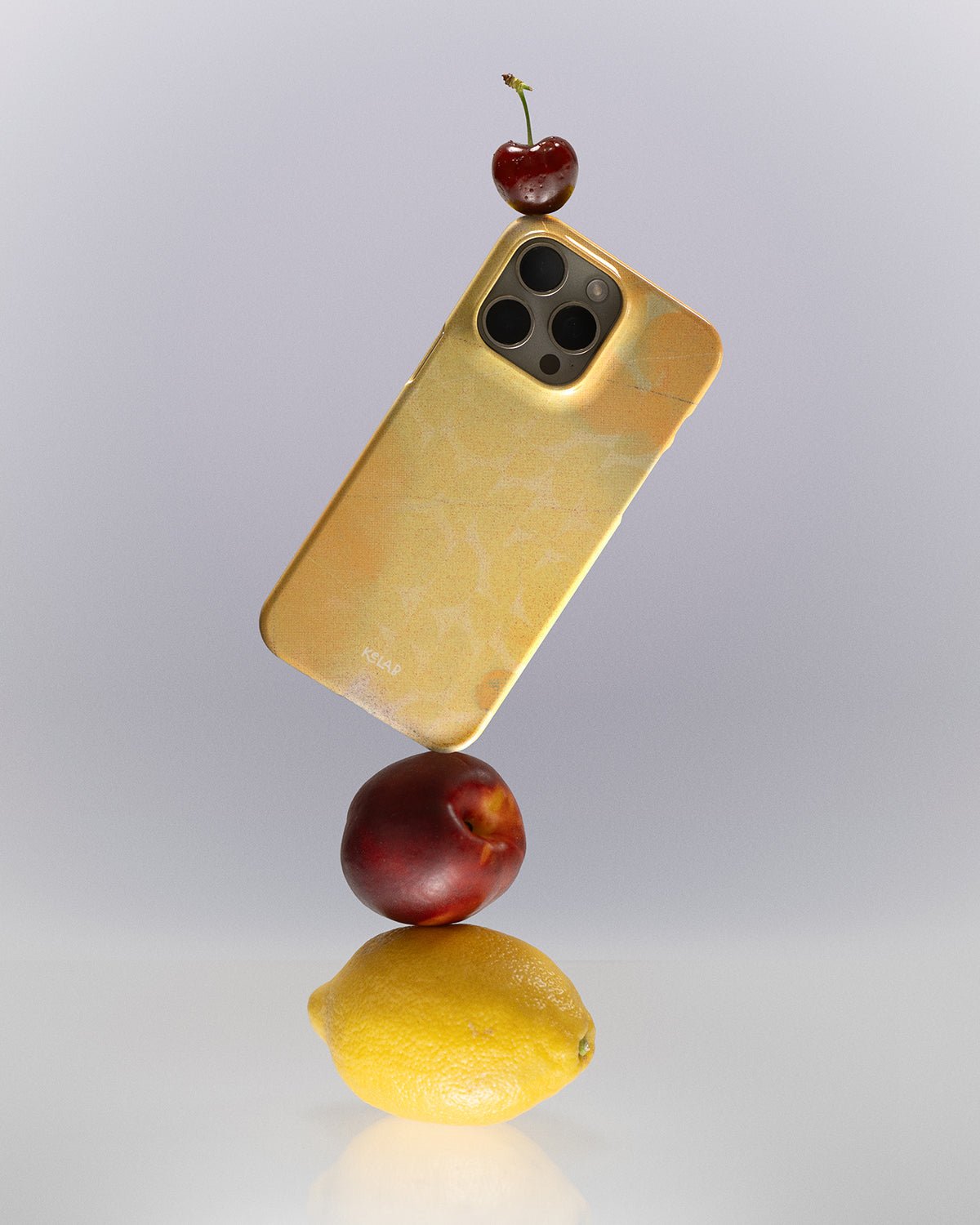 KELAB retro yellow iPhone case styled with summer fruits like lemon and cherry, highlighting its vibrant, nostalgic summer collection appeal.