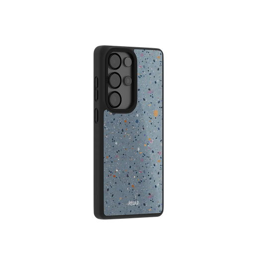 Minimalist phone case for Samsung Galaxy in light blue with paint splatter pattern and TPU material
