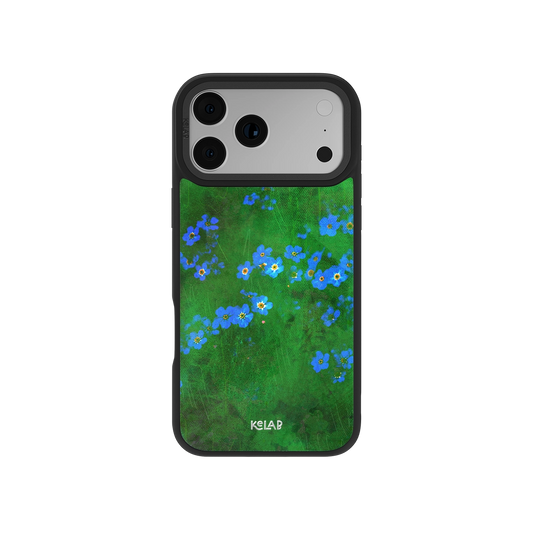 Vibrant green floral iPhone case by KELAB featuring whimsical blue flowers on a glossy surface. Ideal for spring-inspired phone accessories.
