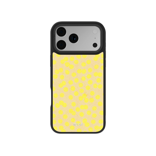 Retro Style Yellow Dotted iPhone Case by KELAB featuring a butter yellow polka dot design with a sleek black bumper for a chic summer aesthetic.