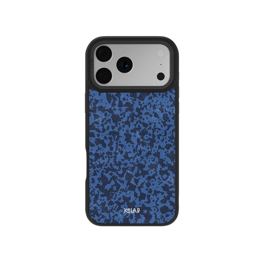 Blue Marble & Streetwear Style iPhone Case with abstract indigo acid wash texture, featuring a sleek black bumper for modern tech protection.