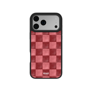 Red checkered iPhone case with MagSafe, textured anti-slip surface, and drop protection edges.