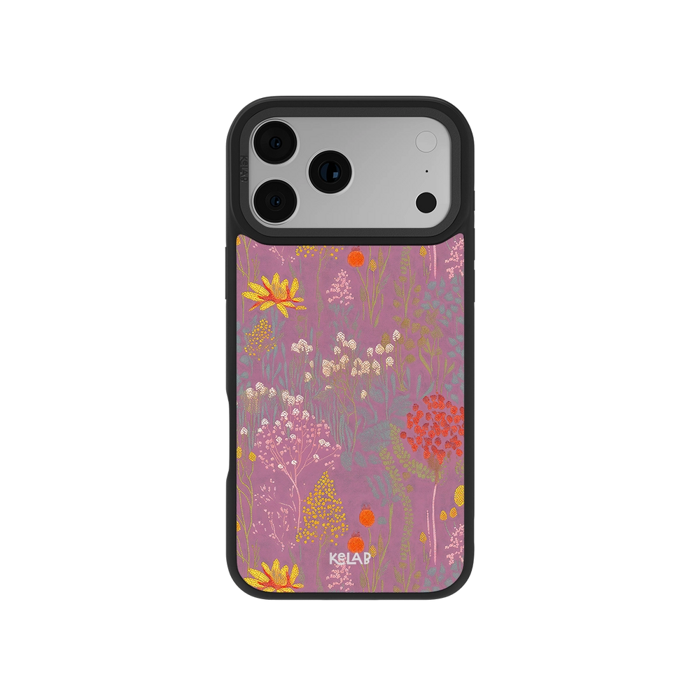 Dusty Pink Wildflower Meadow iPhone Case with orange, cream, and yellow floral sketches on a muted pink background, designed for a classic phone case fit.
