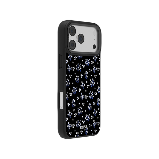 Side view of KELAB Minimalist Black Floral iPhone Case showing slim profile and elegant lily pattern for stylish everyday phone protection.