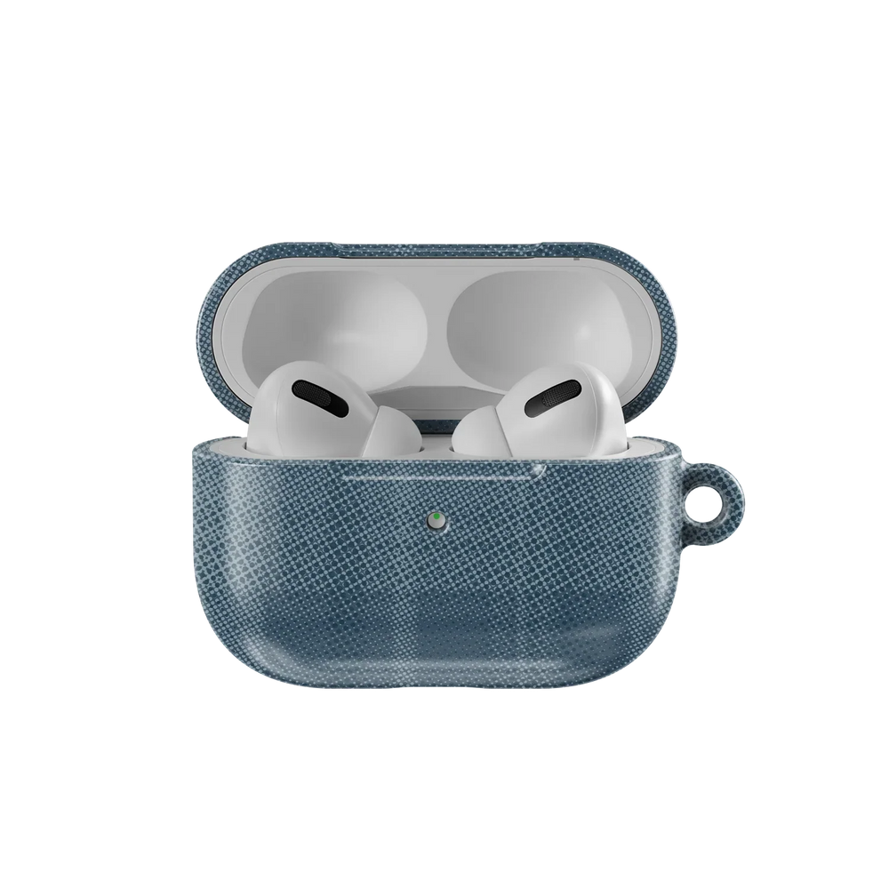 Blue Flannel Minimalist AirPods Case by KELAB shown open with AirPods inside, highlighting its snug fit and muted tartan pattern.