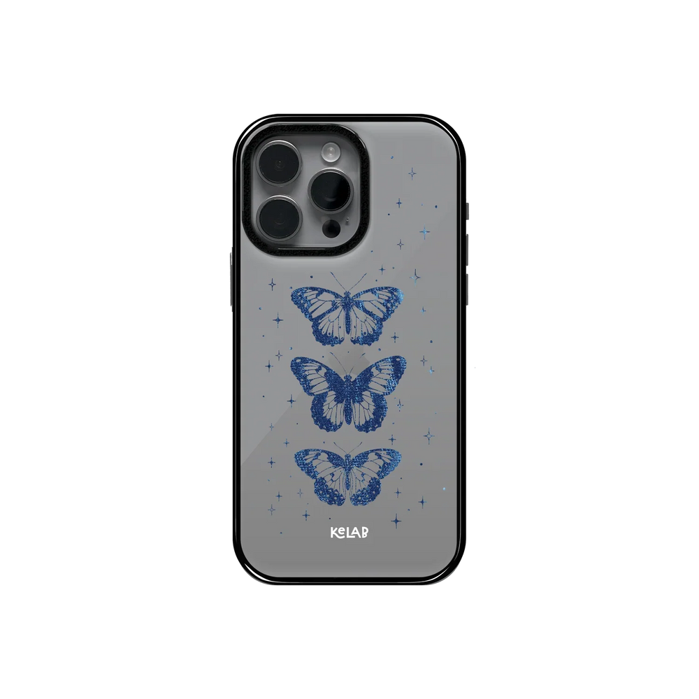 Dreamy Blue Butterfly Clear Case by KELAB featuring three celestial butterflies and star accents on a transparent phone case with a glossy finish.