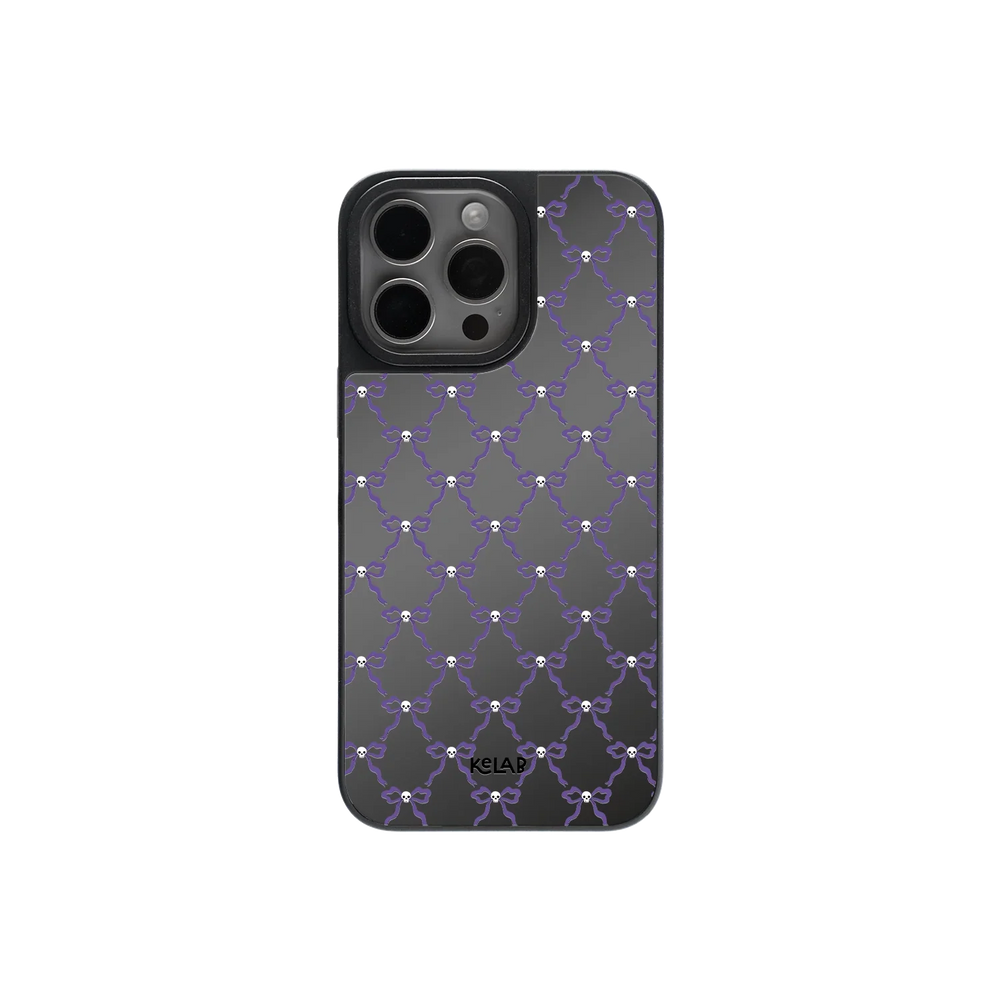 Black and white Halloween mirror phone case with purple chain bow pattern, featuring a glossy reflective back for a spooky yet elegant look.