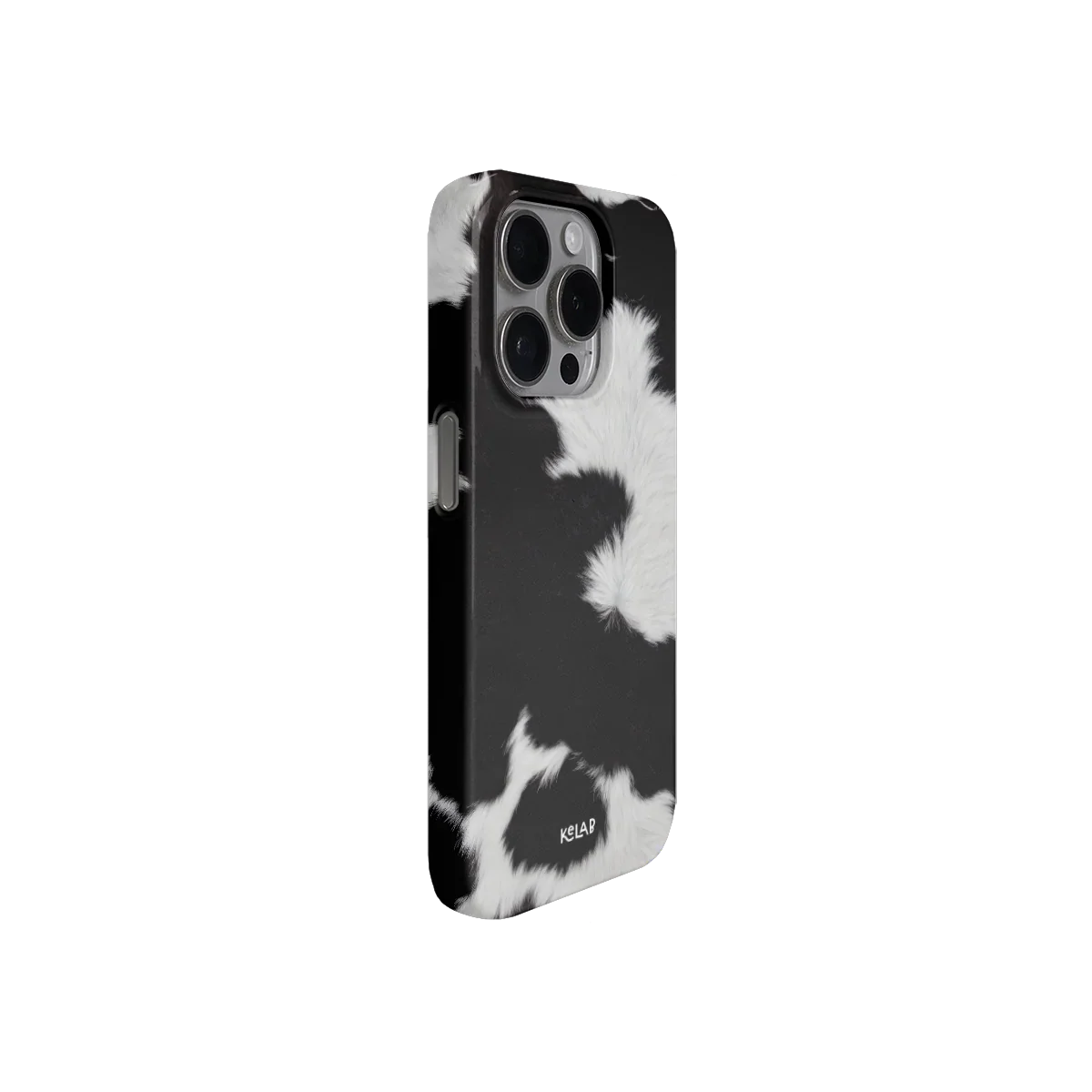 Angled view of the KELAB Black & White Cow Print iPhone Case with a trendy, high-contrast cow pattern perfect for fashion-forward phone accessories.