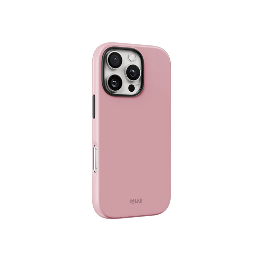 Minimalist solid pink phone case from KELAB shown at an angle, highlighting its slim profile and soft pastel color.